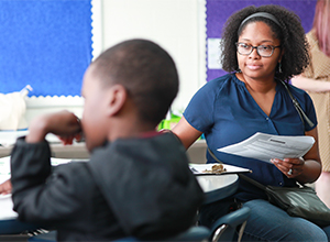 Teacher observing a student